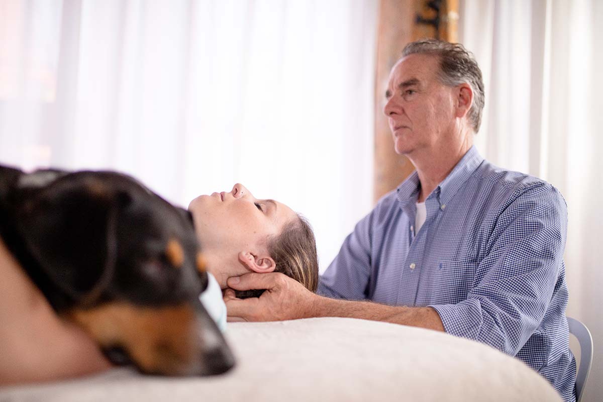 craniosacral therapy with a service dog | Association for Integrated Healing