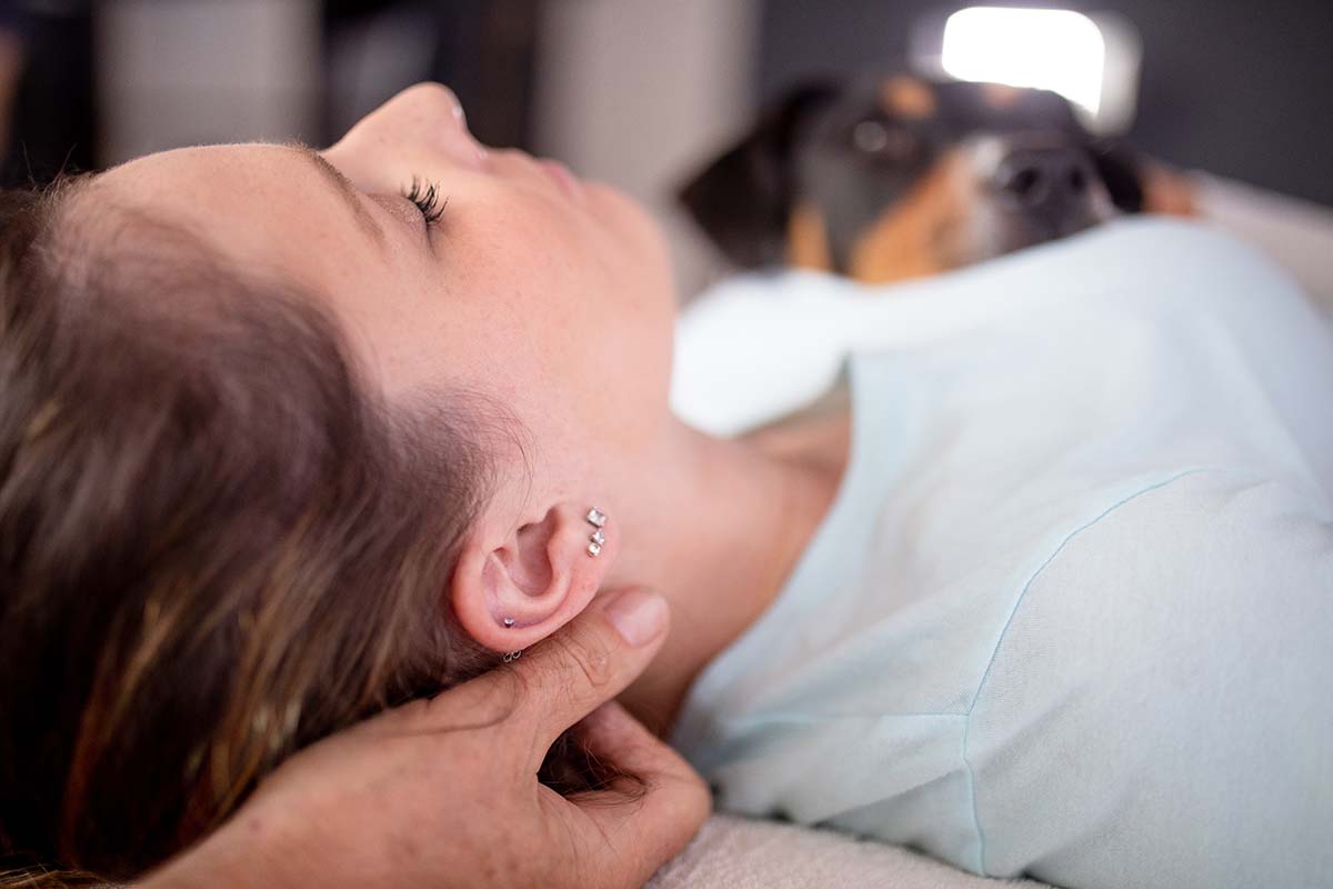 craniosacral therapy with a service dog | Association for Integrated Healing